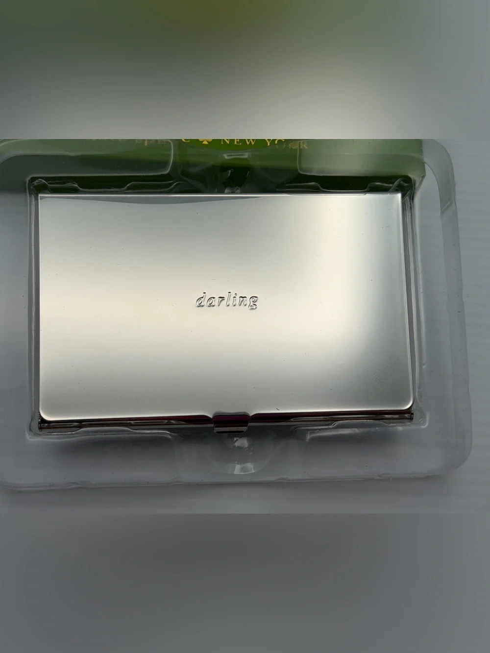 kate spade silver “darling” metal card case